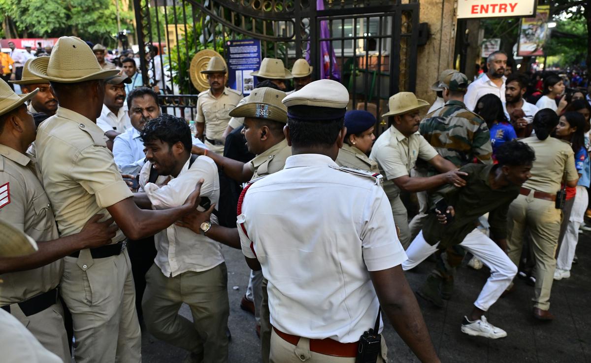 Police trying to control people from forcibly entering M. Chinnaswamy Stadium in Bengaluru on June 4, 2025.