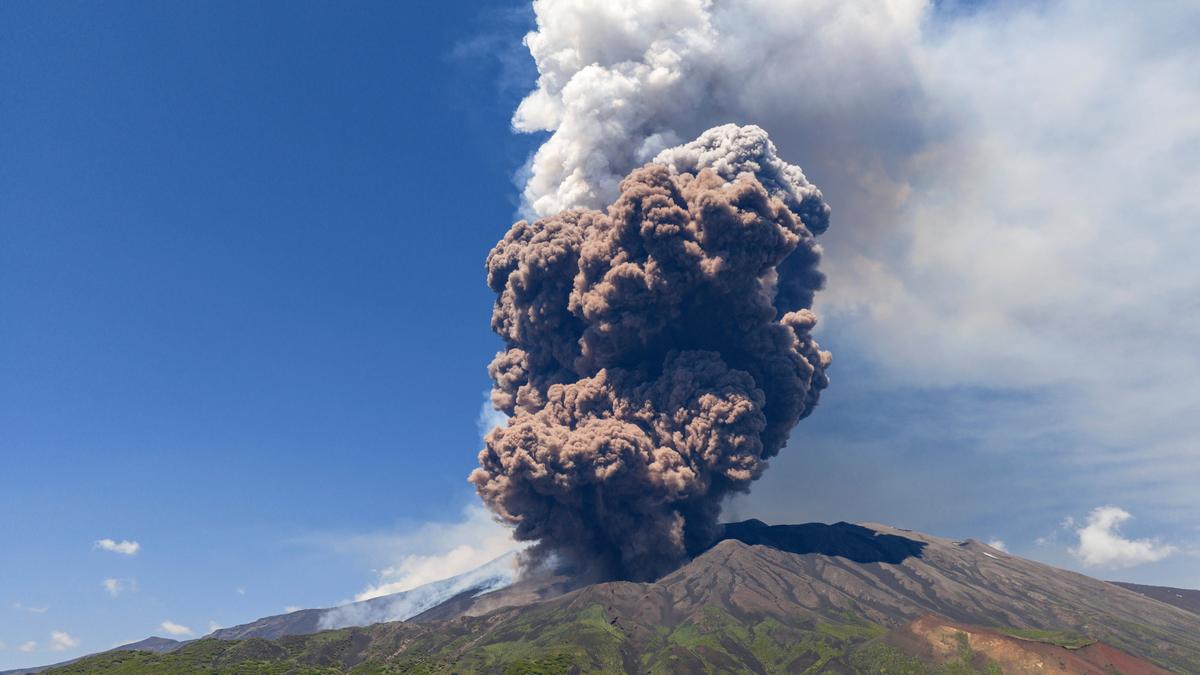 Sicily’s Mount Etna erupts with columns of smoke and ash