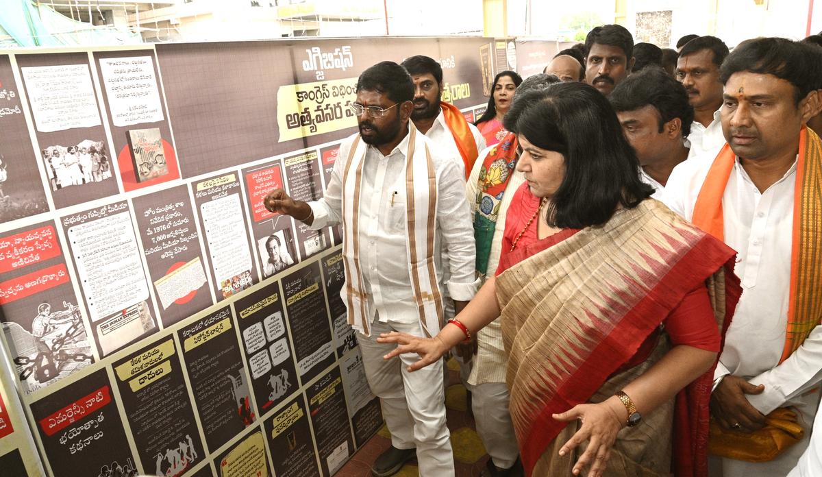 Member of Parliament and BJP national spokesperson Aparajita Sarangi watching a photo gallery on the Emergency, at a programme organised in Tirupati on Wednesday. 