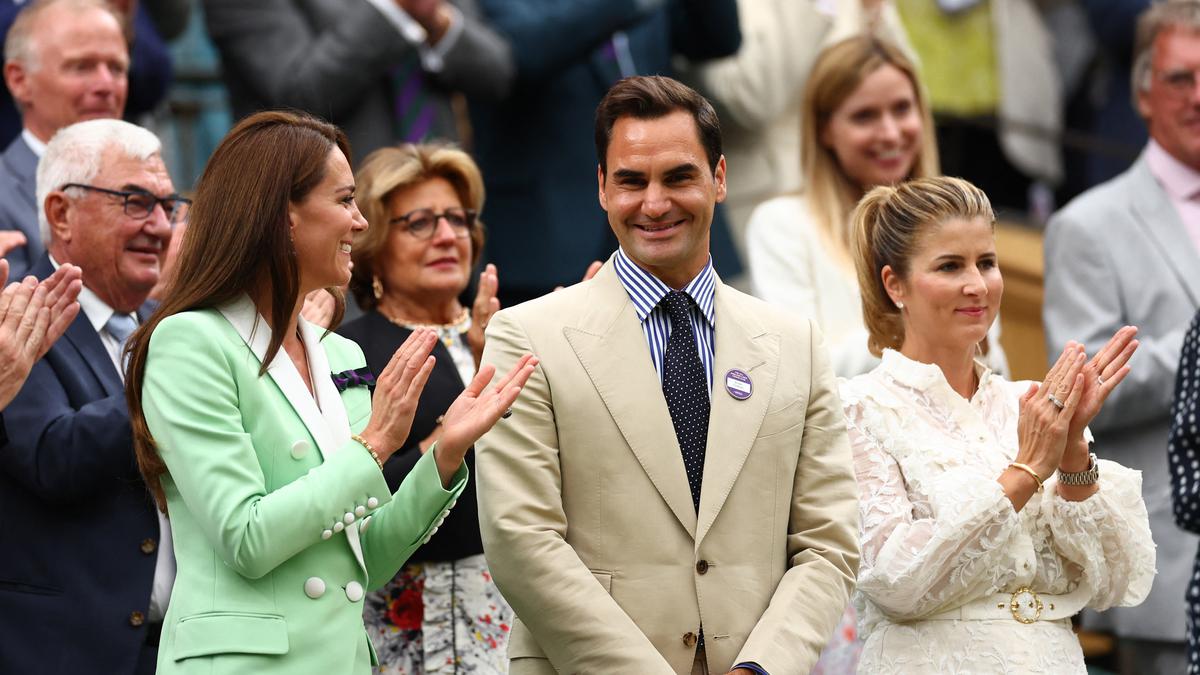 Roger Federer receives a prolonged standing ovation at Wimbledon from followers and Princess Kate