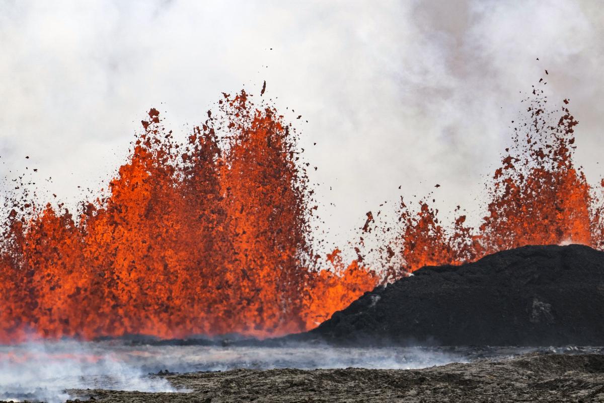 A volcano spews lava in Grindavik, Iceland.