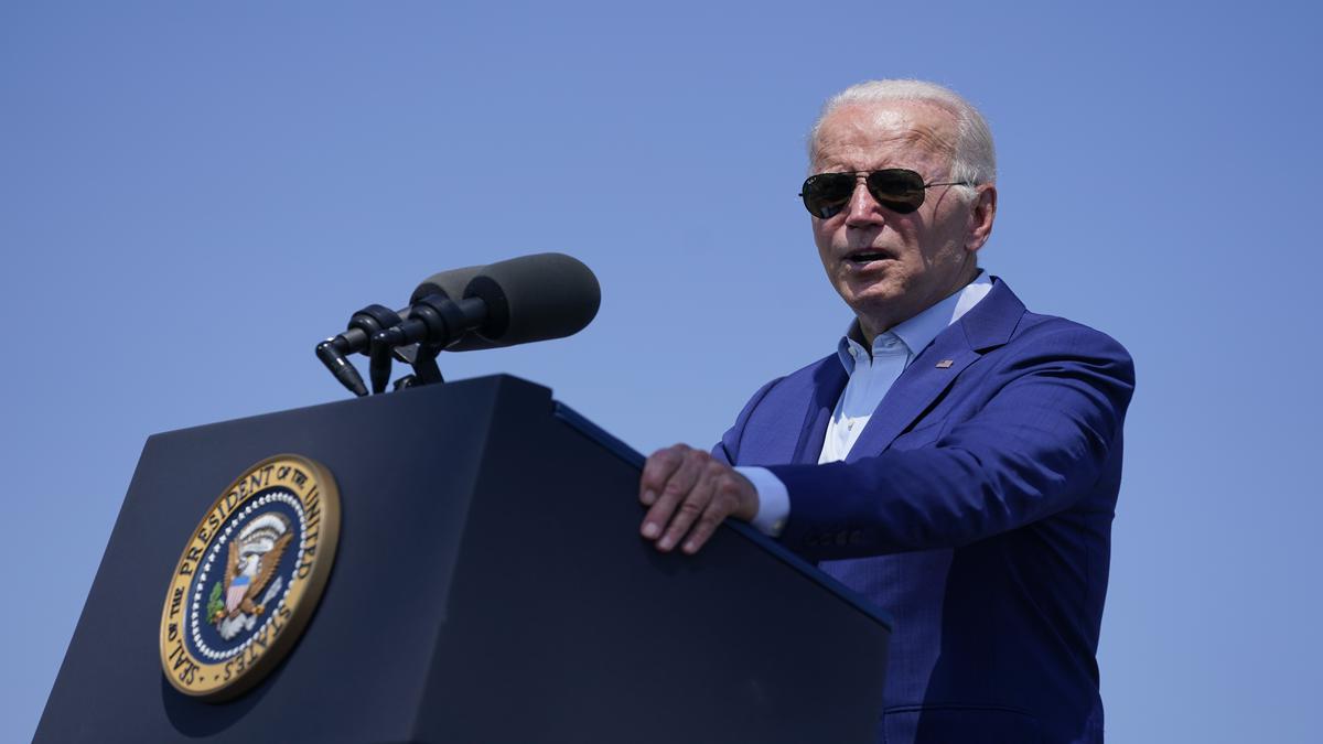 Biden stops short of declaring climate emergency, takes steps on wind power