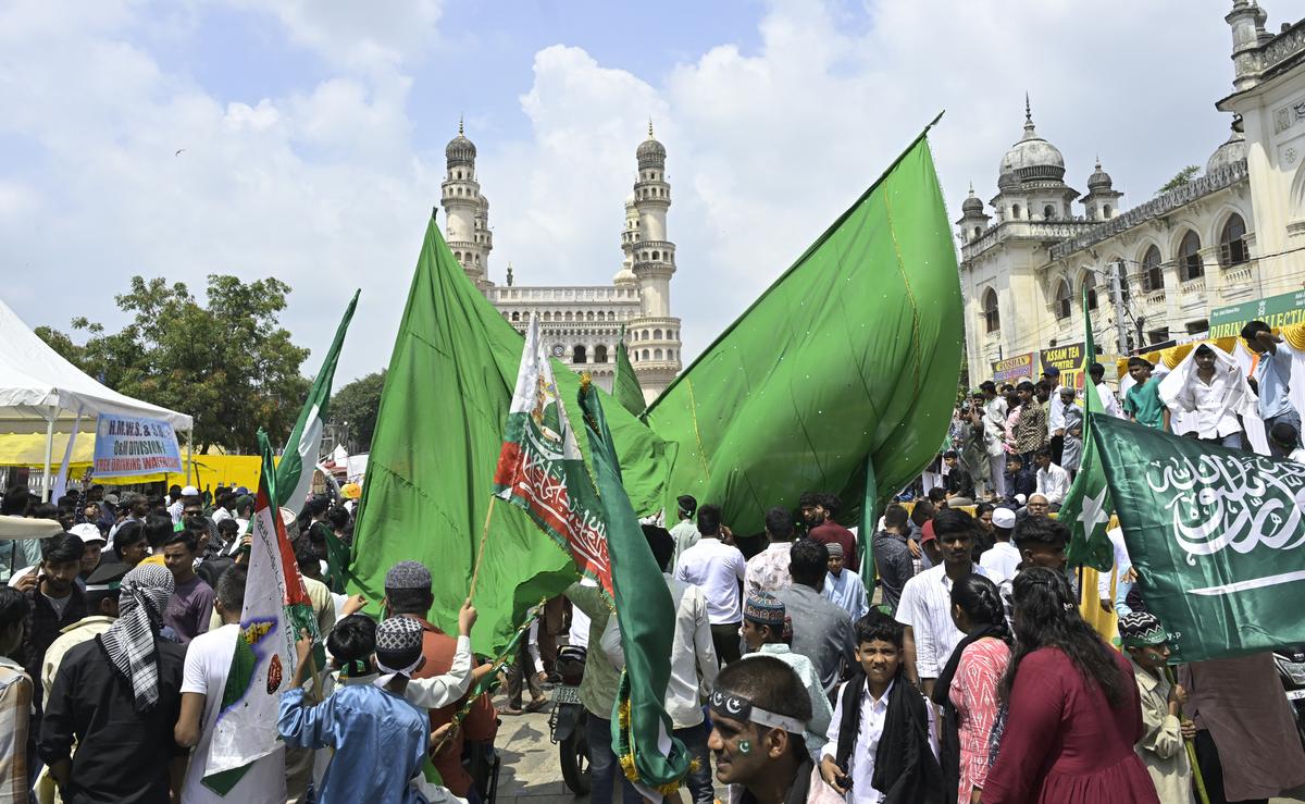 Muslims participate in the Milad juloos at Charminar in Hyderabad on Sunday.