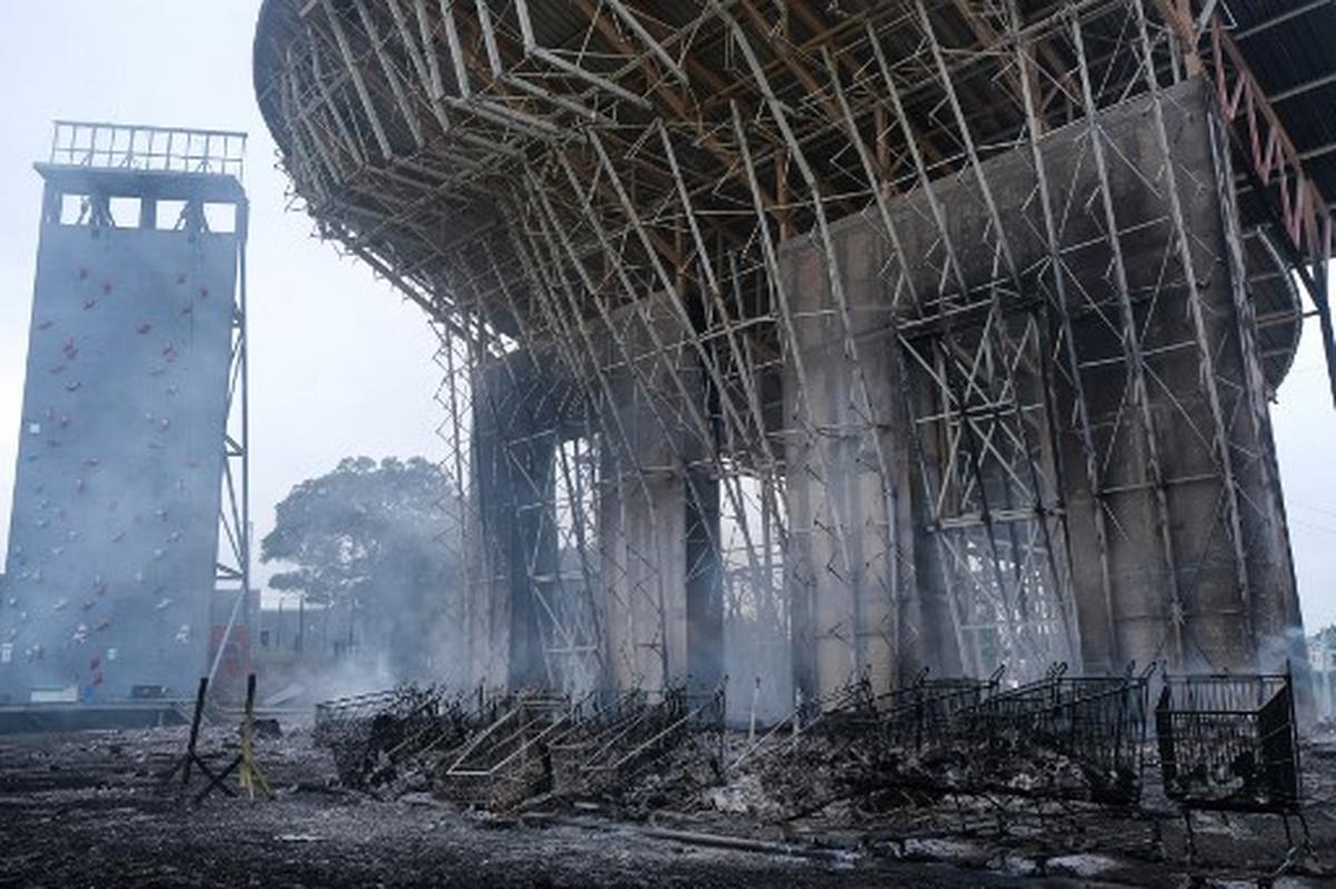 A burnt climbing wall is pictured in the Magenta district of Noumea on May 15, 2024 amid protests linked to a debate on a constitutional bill aimed at enlarging the electorate for upcoming elections of the overseas French territory of New Caledonia. More than 130 people have been arrested in New Caledonia as violent protests rock the French Pacific archipelago, the government said on May 15, 2024, as Paris adopted the constitutional reform that angered pro-independence forces. 