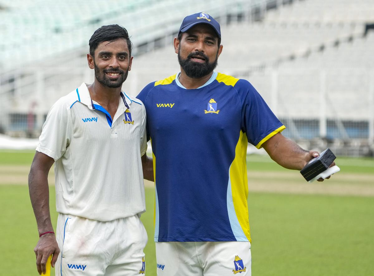 Bengal’s Abhimanyu Easwaran, left, and Mohammed Shami celebrate after winning the Ranji Trophy match against Uttarakhand, at the Eden Gardens, in Kolkata, Saturday, Oct. 18, 2025. Bengal’s Abhimanyu Easwaran, left, and Mohammed Shami celebrate after winning the Ranji Trophy match against Uttarakhand, at the Eden Gardens, in Kolkata, Saturday, Oct. 18, 2025.