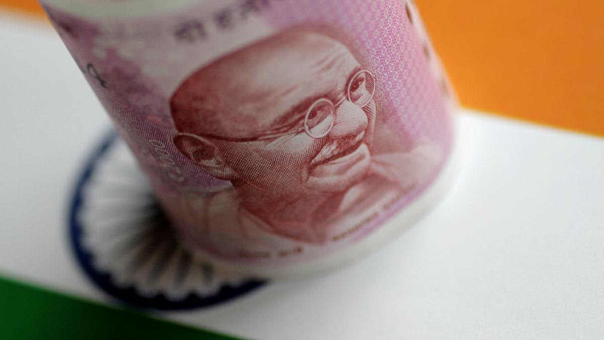 Rupee slips 4 paise to 82.24 against dollar in early trade