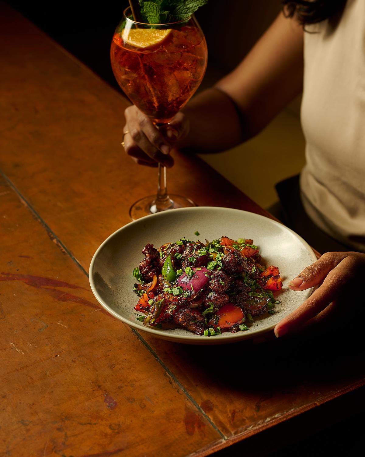  The Mallipoo Spritz served with Chinese-ish chilli chicken