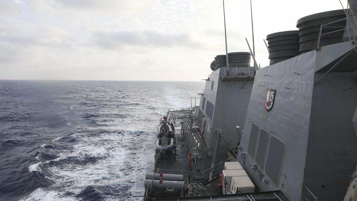 China threatens consequences over U.S. warship's actions
