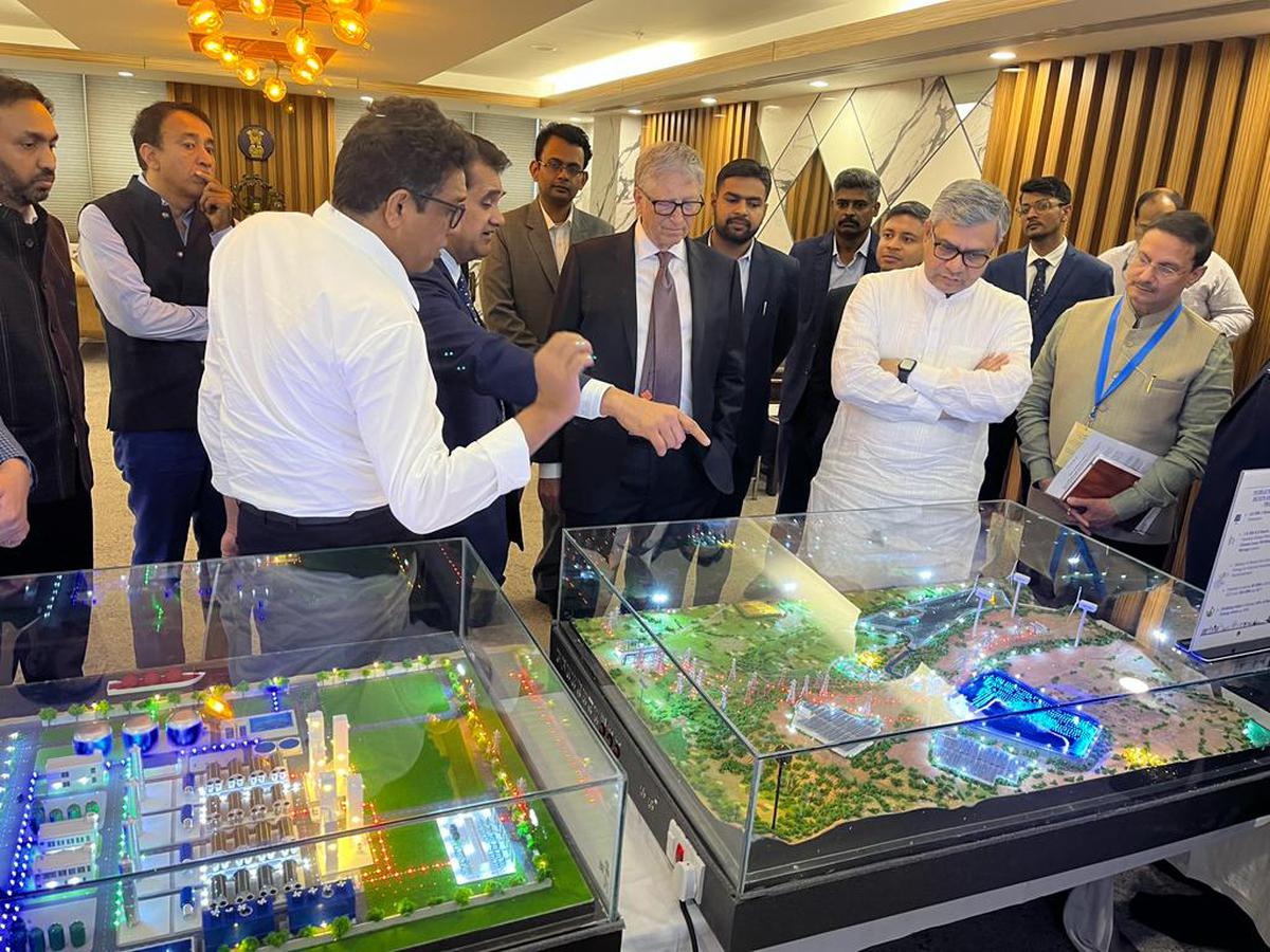 Greenco Group MD Anil Chalmalasetty and officials brief Bill Gates about the model of Greenco's renewable project in Kurnool, at the venue of the G-20 Summit, in New Delhi on March 2, 2023.  Photo: Special Arrangement
