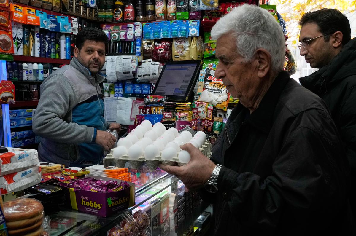 A man shops for eggs at a grocery store in northern Tehran, Iran, on Tuesday, Jan. 6, 2026. A man shops for eggs at a grocery store in northern Tehran, Iran, on Tuesday, Jan. 6, 2026.