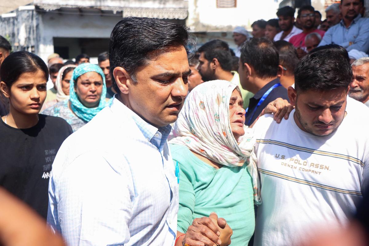 The family members of ASI Sandeep Lather mourn his death, in Rohtak.