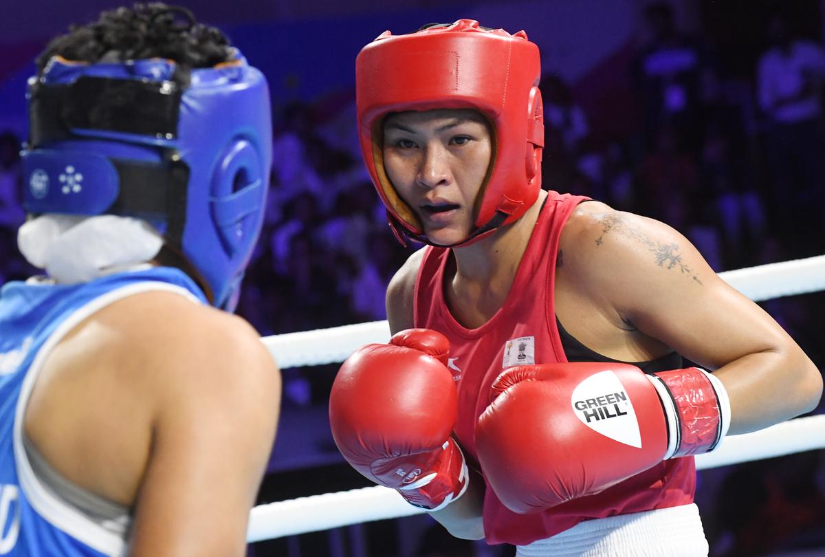 Jamuna Boro of Assam in red against Nirmal of Nagaland in the feather weight category of the women’s boxing at Gandhinagar, during the 36th National Games on October 6, 2022.