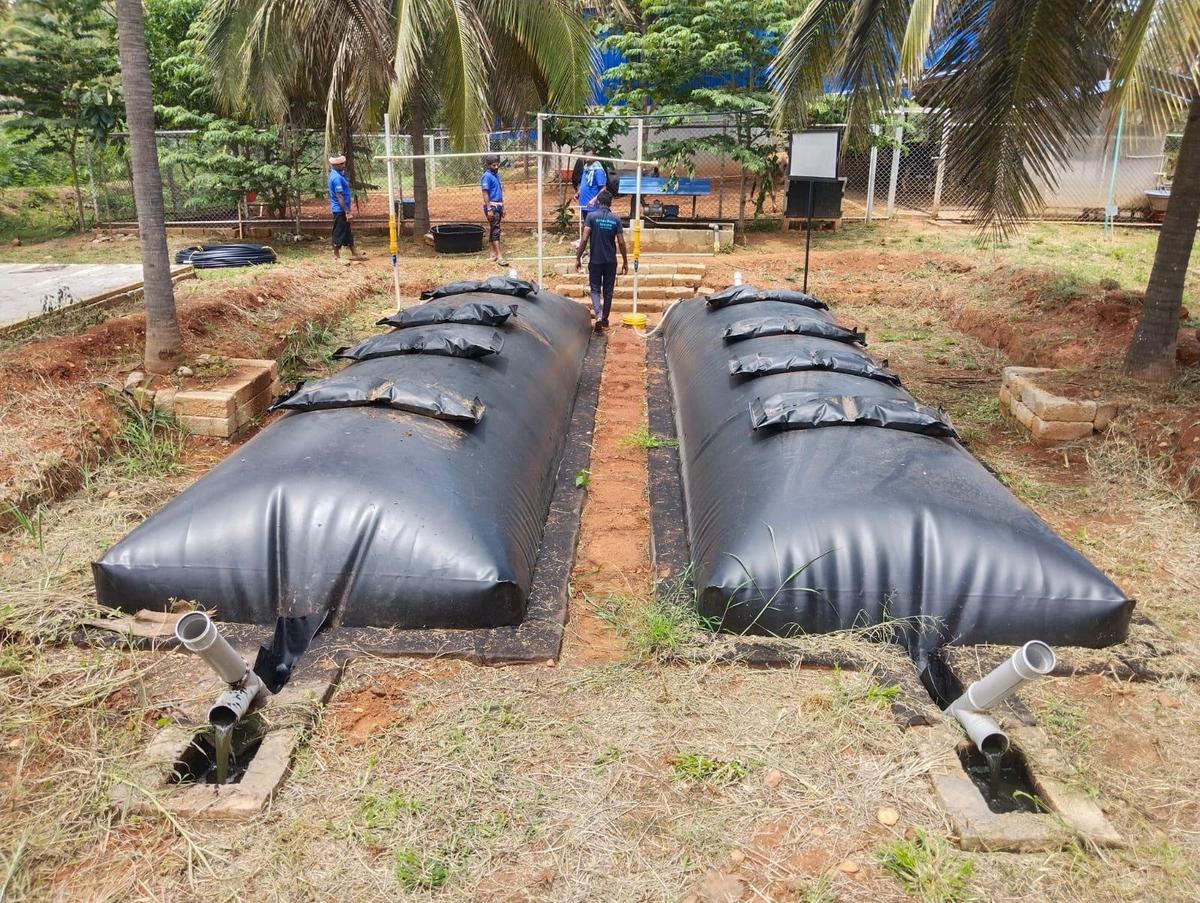 Each biogas plant requires initial investment up to ₹15,000. It converts methane in cow manure into a sustainable source of renewable energy.