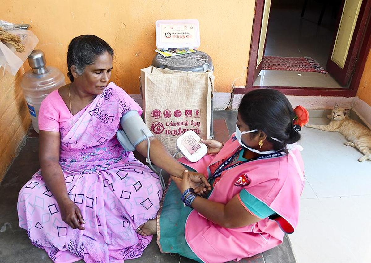 A healthcare volunteer checks blood pressure and blood sugar of residents in Chennai as part of ‘Makkalai thedi Maruthuvam scheme’. A healthcare volunteer checks blood pressure and blood sugar of residents in Chennai as part of ‘Makkalai thedi Maruthuvam scheme’.