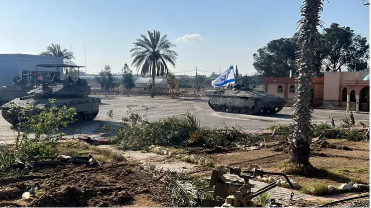 Footage released by the Israeli army shows the 401st brigade’s combat tanks entering the Palestinian side of the Rafah border crossing