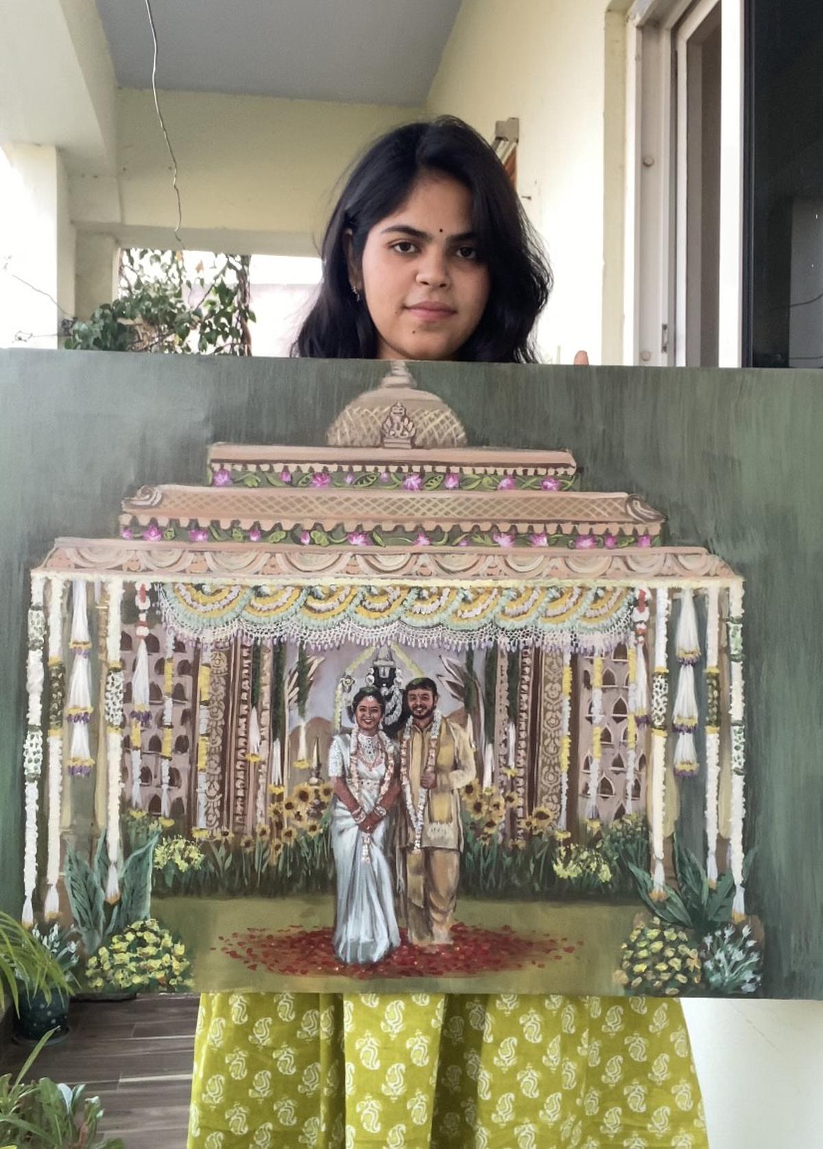 Dhanushya Pallam shows a painting done by her