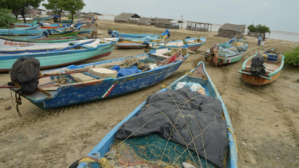 Two Sri Lankan fishermen arrested as their boat comes ashore at Kodiyakkarai coast in Nagapattinam