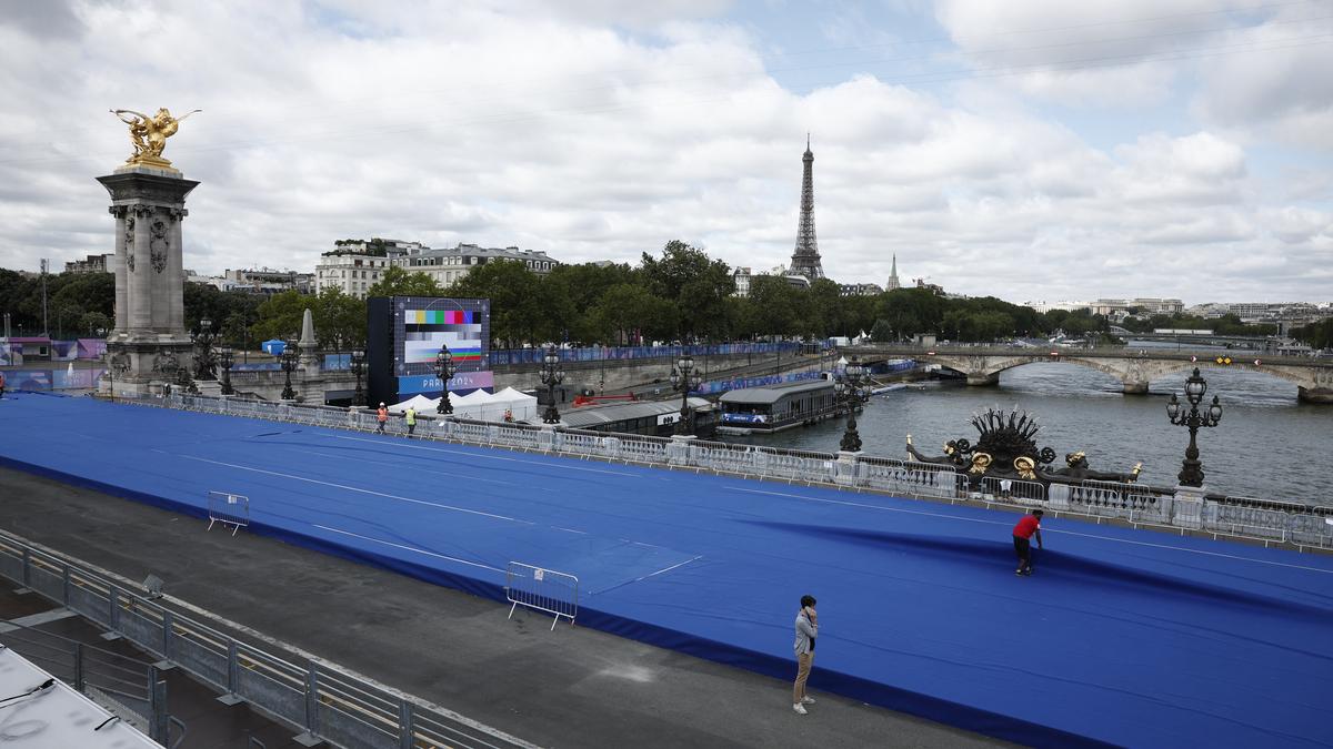 Olympics organisers cancel first triathlon training over Seine pollution