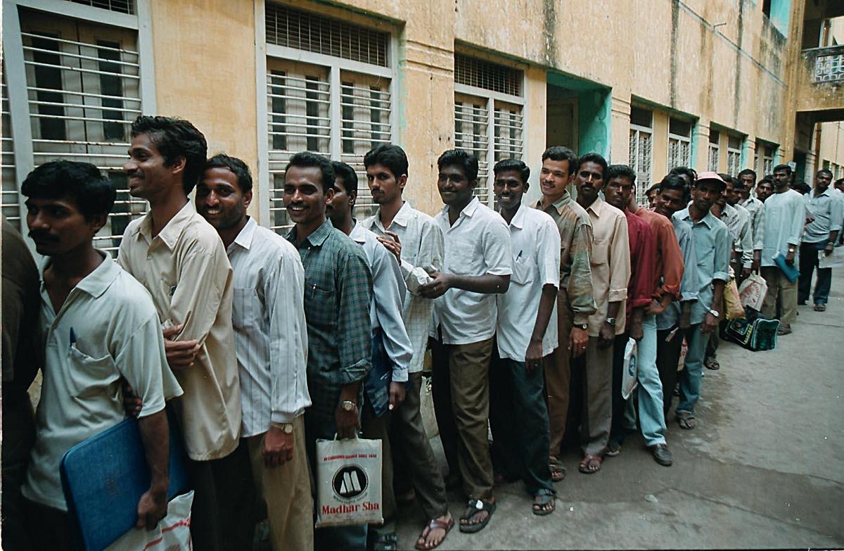 Applicants queue up during a drive for temporary recruitment of MTC crew at Chennai during the transport employees’ strike on November 11, 2001