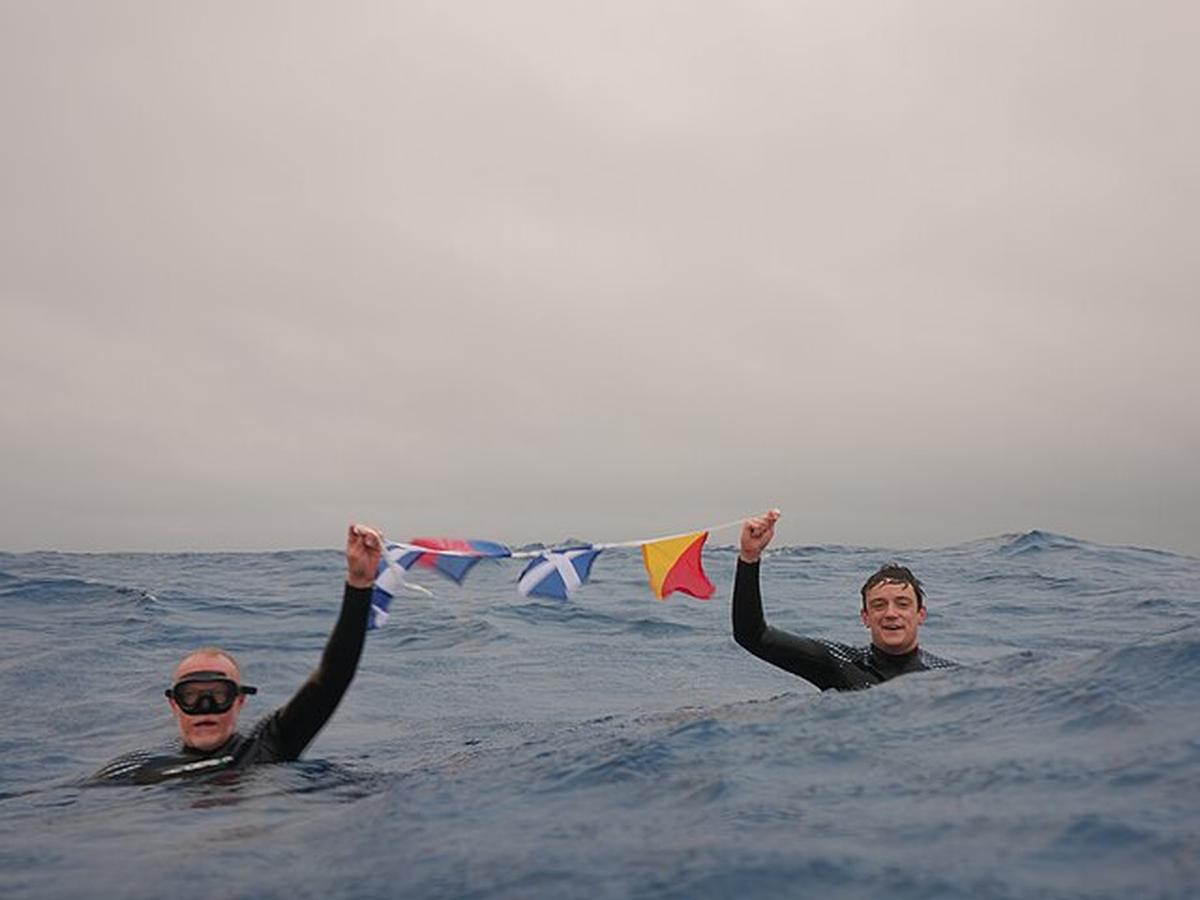 Fun Fact: A Human Finally Reached Point Nemo
For decades, Point Nemo existed only as a set of coordinates on a map. That changed on March 20, 2024, when British explorer and tech entrepreneur Chris Brown (L), along with his son Mika (R), made history. After an arduous 10-day voyage aboard an expedition ship from Chile, they reached the exact “pole of inaccessibility.” To celebrate, they jumped into the freezing, 4-kilometer-deep water, becoming the first recorded people to ever swim at Point Nemo.