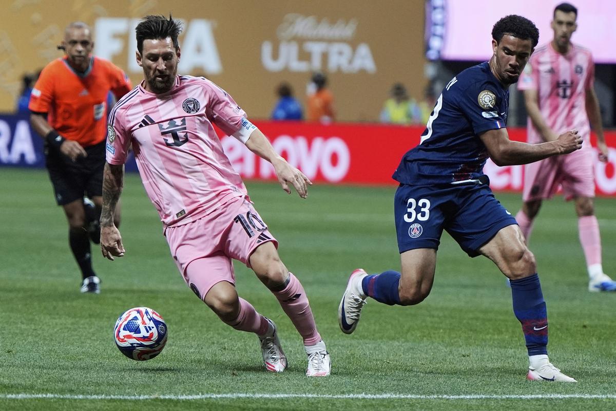 Inter Miami’s Lionel Messi controls the ball past Paris Saint-Germain’s Warren Zaire-Emery. Inter Miami’s Lionel Messi controls the ball past Paris Saint-Germain’s Warren Zaire-Emery.