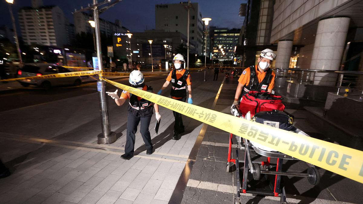 13 injured in South Korea when a man rams a car onto a sidewalk, stabs pedestrians
