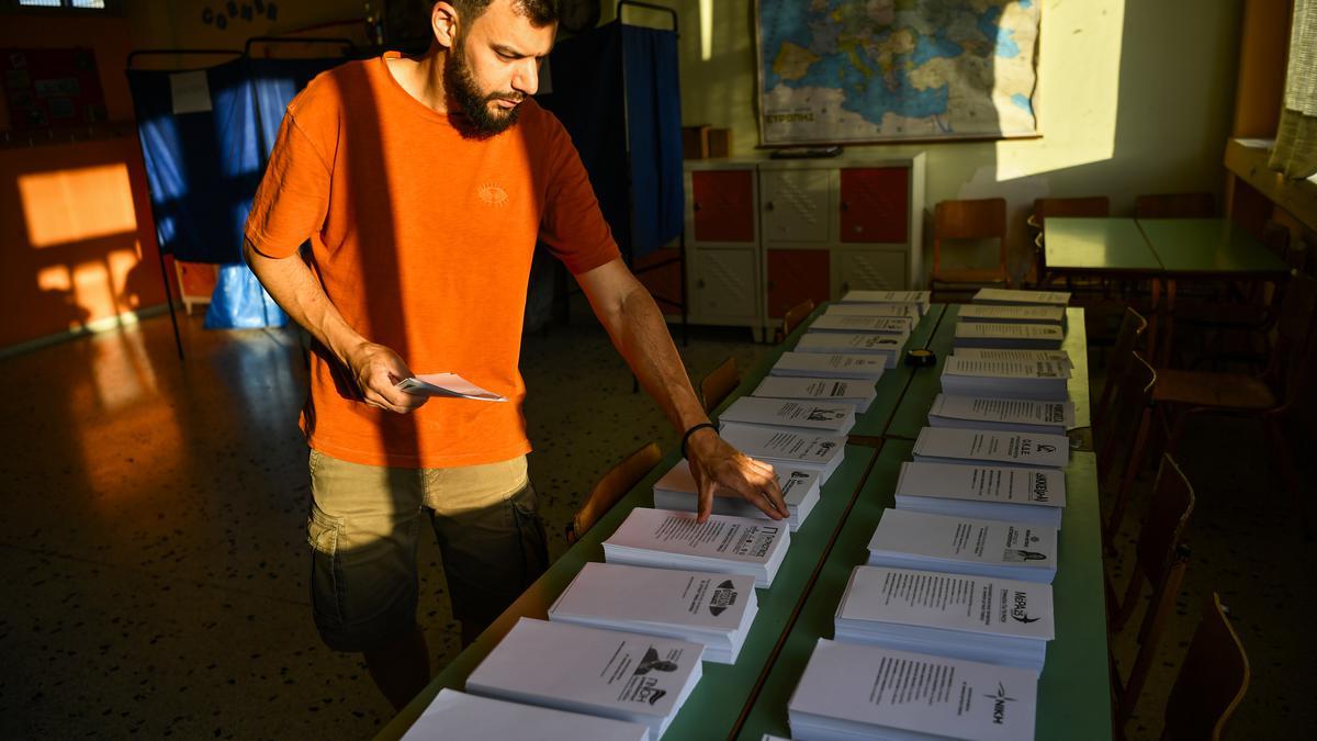 Greeks vote in second general election in 5 weeks, with conservative party favoured to win majority