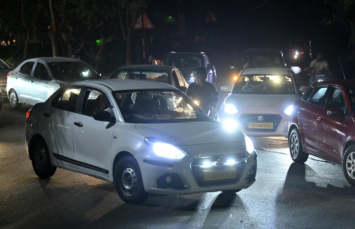Two-wheeler and four-wheeler drivers jump signals in the absence of traffic police personnel at a junction in Hyderabad. Two-wheeler and four-wheeler drivers jump signals in the absence of traffic police personnel at a junction in Hyderabad.