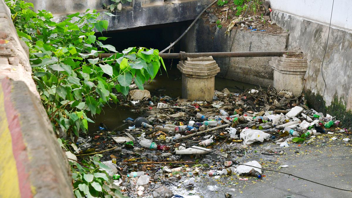 Drainage channel on Goods Shed Road in Coimbatore chokes with garbage