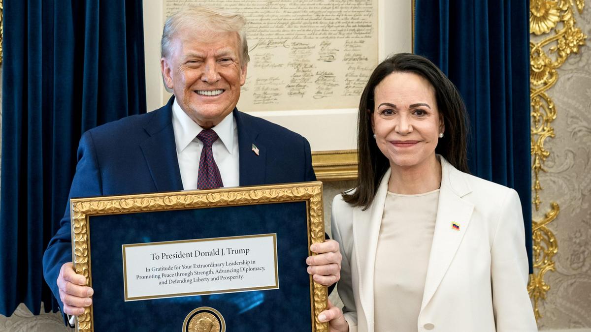 Nobel Peace Prize inseparable from laureate, award body says after Trump gets medal from Machado