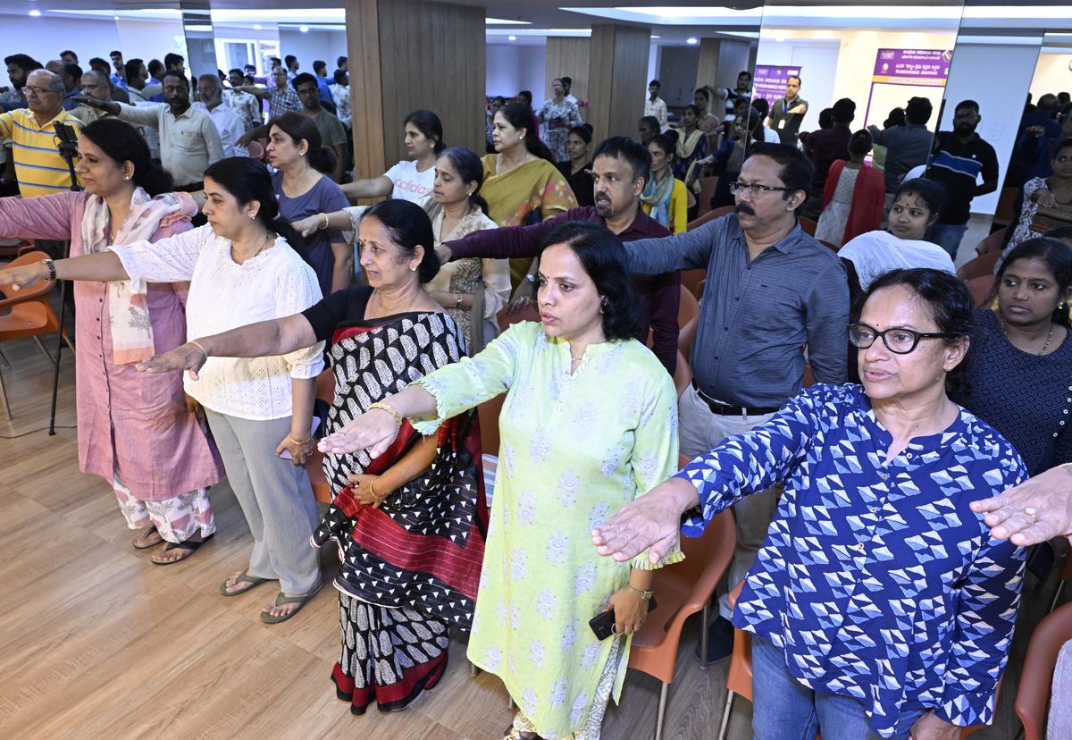 Residents of an apartment taking oath during a vot​er awareness campaign organised by Dakshina Kannada SVEEP Committee, in Mangaluru on Sunday, March ​31.