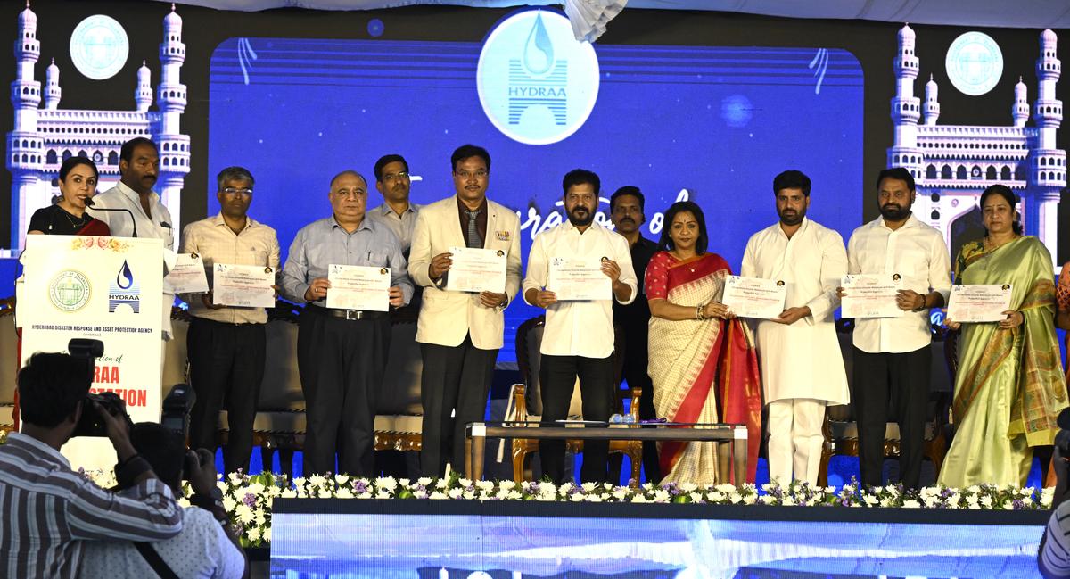 Chief Minister A. Revanth Reddy and officials at the inauguration of HYDRAA police station near Buddha Bhavan in Hyderabad on Thursday. 