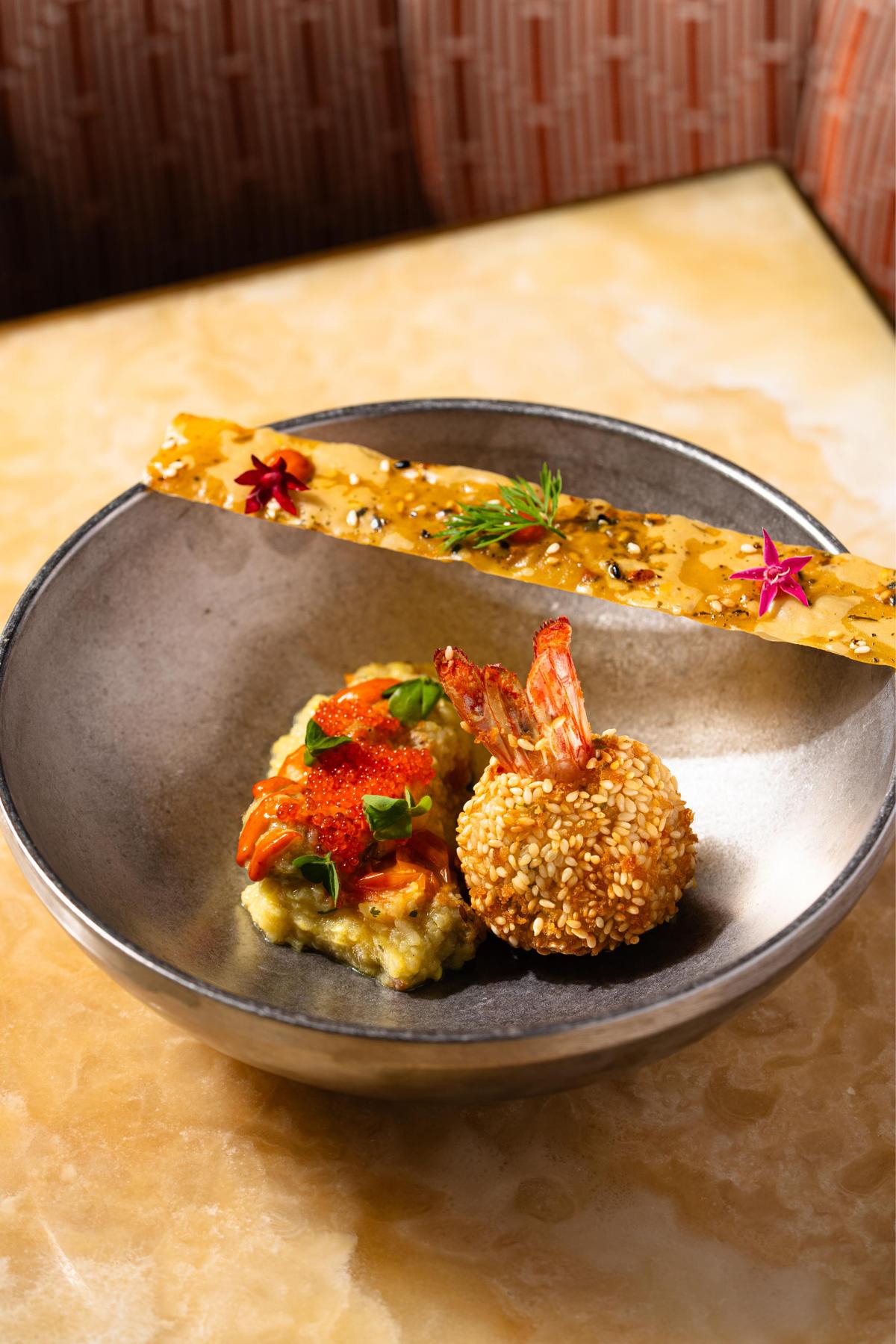 Tiger prawn till bugga with Amritsari vadi rice Tiger prawn till bugga with Amritsari vadi rice