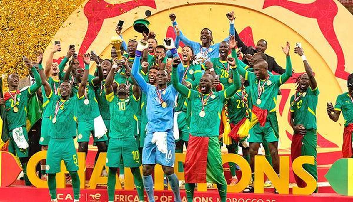 Senegalese players celebrate after winning the Africa Cup of Nations final soccer match agaisnt Morocco
