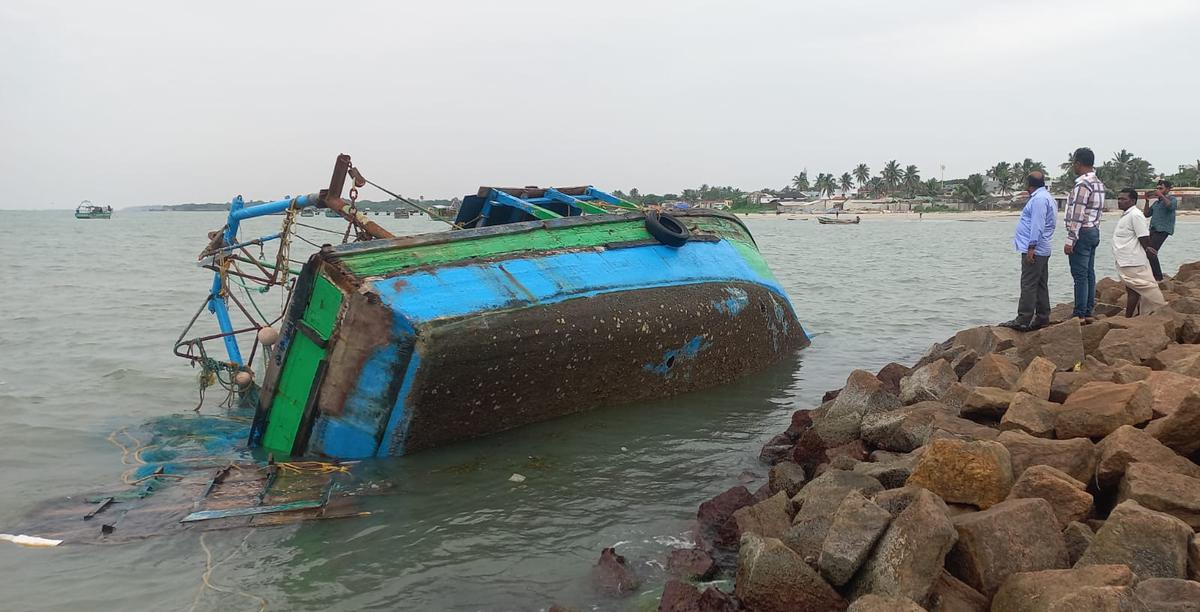 A mechanised fishing boat anchored in the Mandapam south sea in Ramanathapuram district drifted to the shore and capsized on the night of December 8, 2022, following gusty winds due to cyclone Mandous.