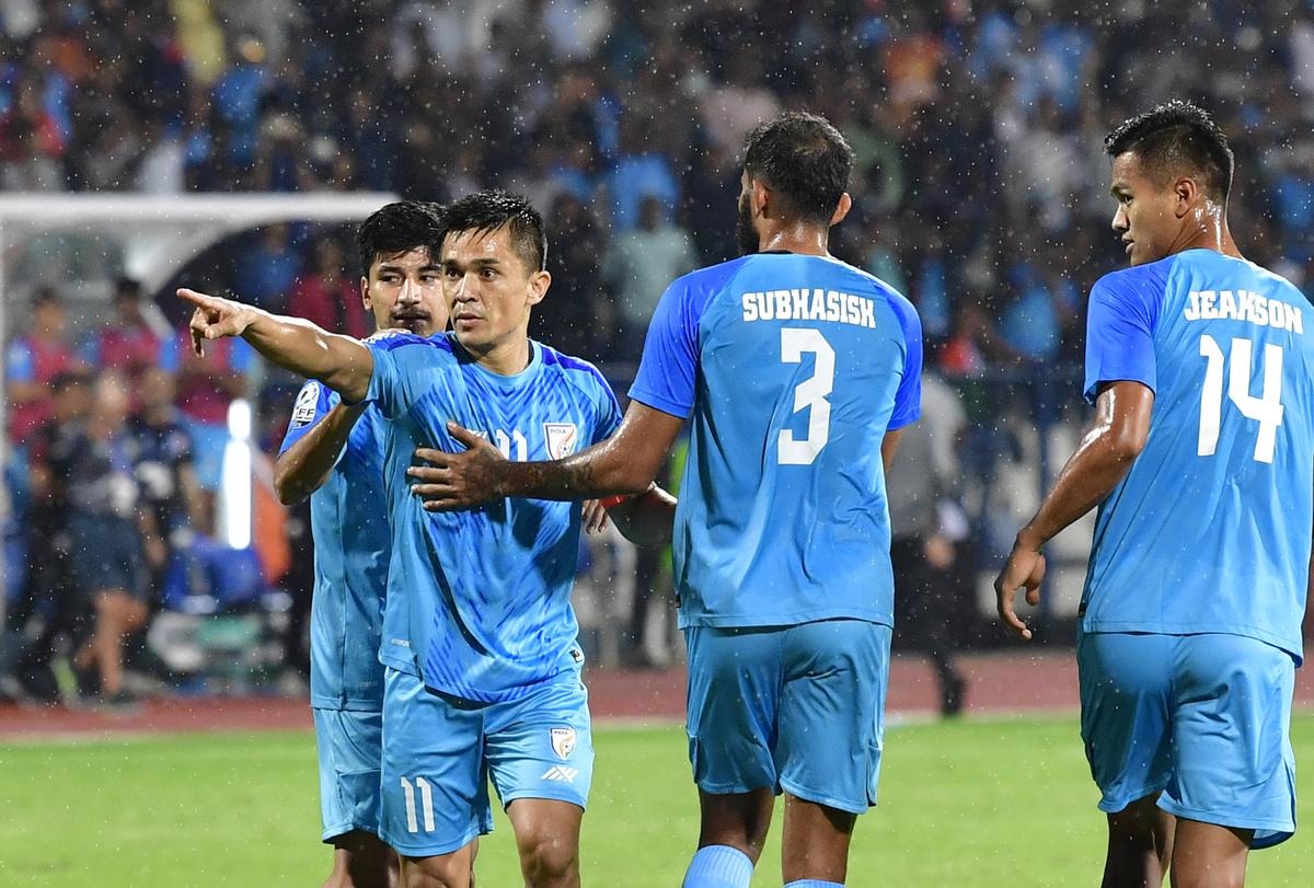 Indian captain Sunil Chhetri celebrates with teammates after scoring against Pakistan in the SAFF Championship 2023 at the Kanteerava Stadium, in Bengaluru on June 21, 2023.  