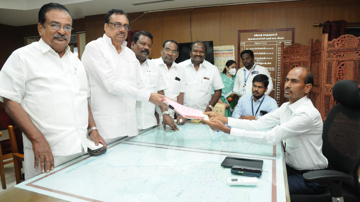 Elangovan and OPS group candidate file nomination papers in Erode