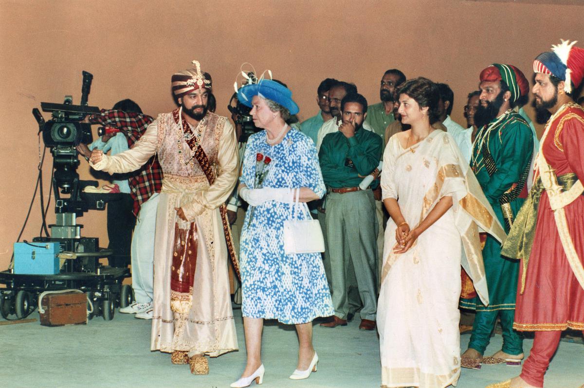 Actor Kamal Haasan showing Queen Elizabeth II around the sets of his film Marudhanayagam at the M.G.R. Film City on October 17, 1997. 
