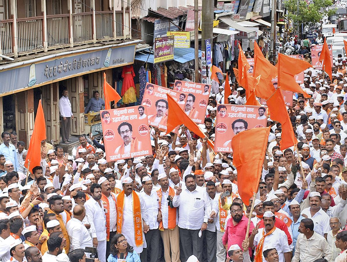 Shiv Sena workers take out a protest rally in support of party chief Uddhav Thackeray in Kolhapur on June 24. 