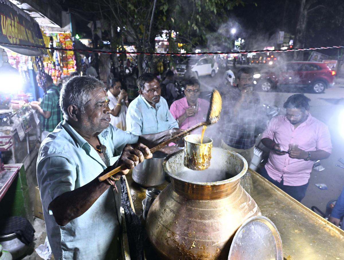  K.Santhanam serving hot Paruthipaal (cottonseed milk) at his shop in Madurai. 