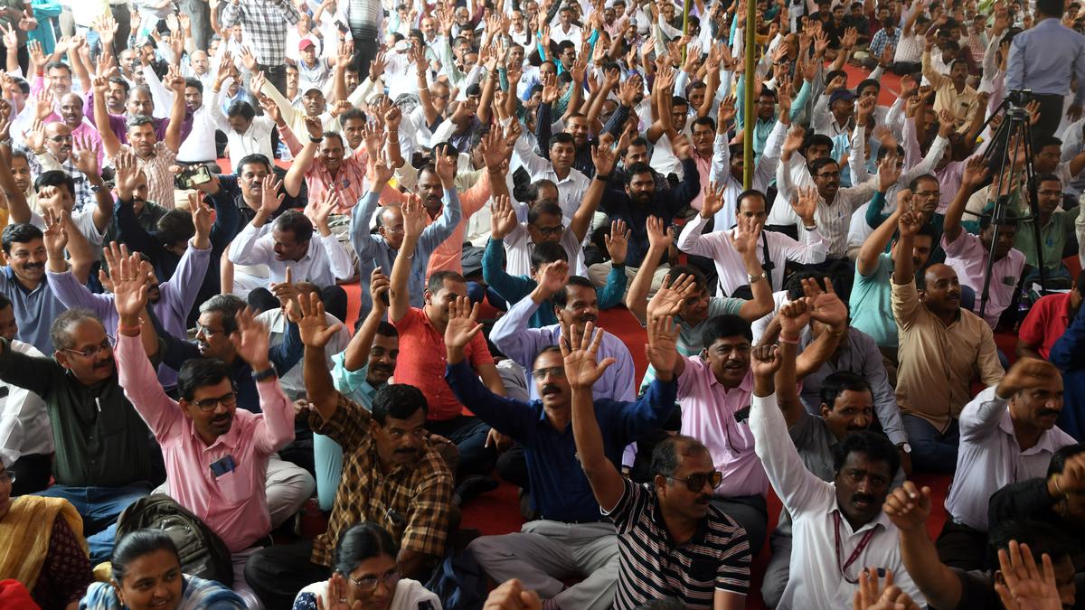 Government PU college principals and lecturers stage protest at Freedom Park