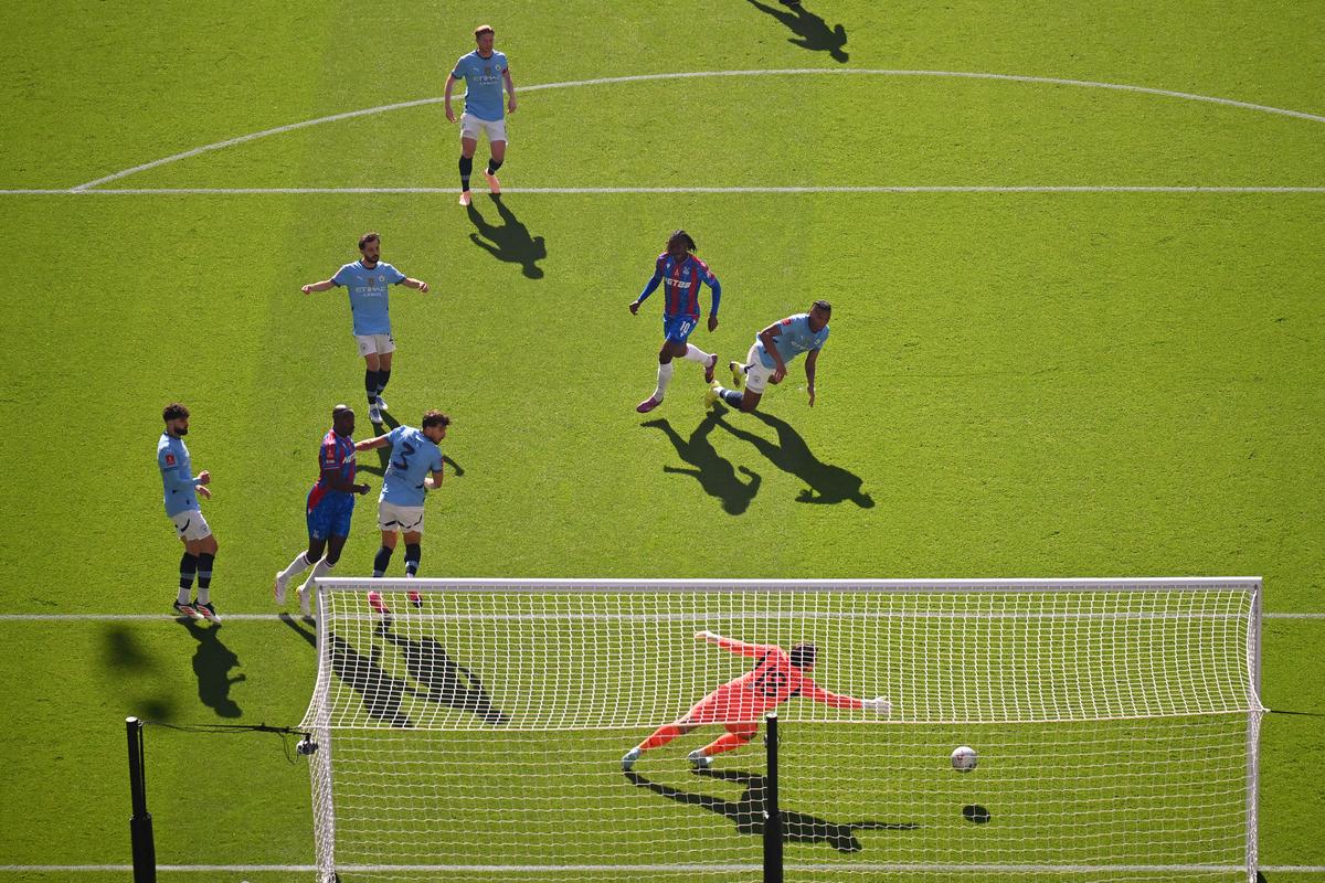 Eberechi Eze of Crystal Palace scores his team’s first goal past Stefan Ortega of Manchester City during the Emirates FA Cup Final match between Crystal Palace and Manchester City at Wembley Stadium on May 17, 2025 in London, England. Eberechi Eze of Crystal Palace scores his team’s first goal past Stefan Ortega of Manchester City during the Emirates FA Cup Final match between Crystal Palace and Manchester City at Wembley Stadium on May 17, 2025 in London, England.