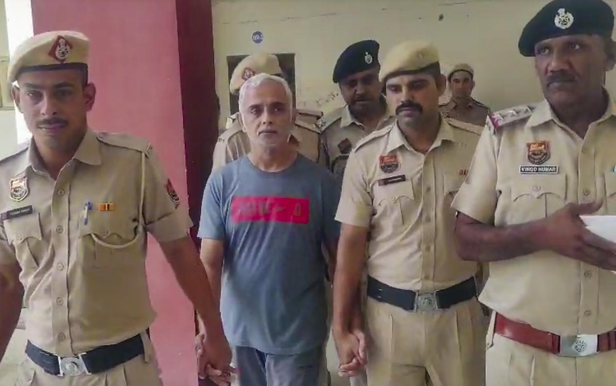 Deepak Yadav, 49-year old man accused in the murder of her daughter and former tennis player Radhika Yadav, being brought to a court, in Gurugram Deepak Yadav, 49-year old man accused in the murder of her daughter and former tennis player Radhika Yadav, being brought to a court, in Gurugram