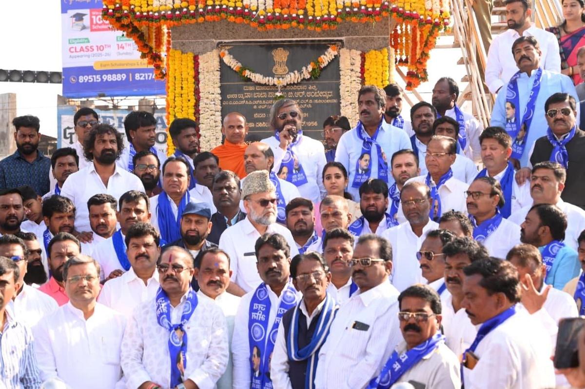 Forest Minister and Bidar in-charge Eshwar B. Khandre and Municipal Administration Minister Rahim Khan observing the 69th Mahaparinirvan Diwas of Dr. B.R. Ambedkar in Bidar on Saturday. 