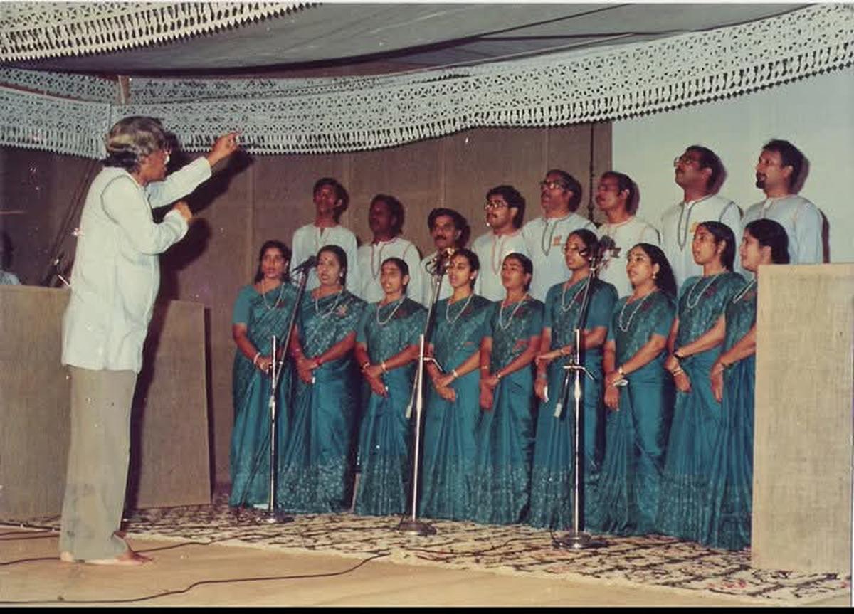 M.B. Srinivasan conducting the choir.