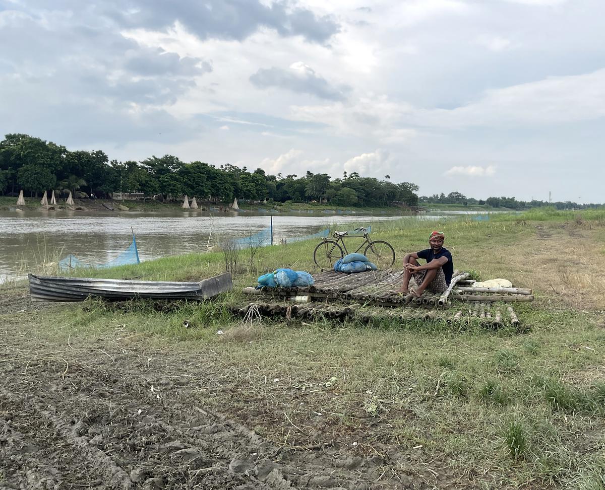 A villager who crossed a river and the Charbhadra border outpost in West Bengal’s Murshidabad district to work on his field.