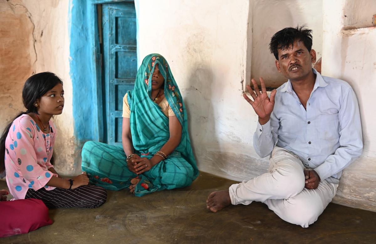 SAGAR: 06/08/2024, FOR SPOTLIGHT_Parents and sister of Nitish Patel, 10, Father, sister, and other family members of Ashutosh Prajapati, 11, who died in a wall collapse incident during a religious event, sit at their house in Shahpur town of Madhya Pradesh’s Sagar district. Photo : A.M.FARUQUI/The Hindu