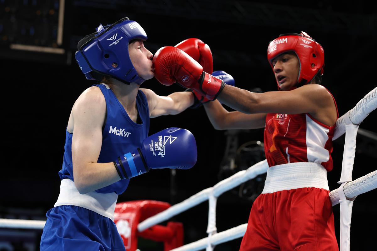 India’s Nitu Ghanghas connects one on  Nicole Clyde’s face during their women’s 45kg-48kg Minimumweight boxing quarterfinal on day six of the Birmingham 2022 Commonwealth Games at NEC Arena on August 03, 2022.