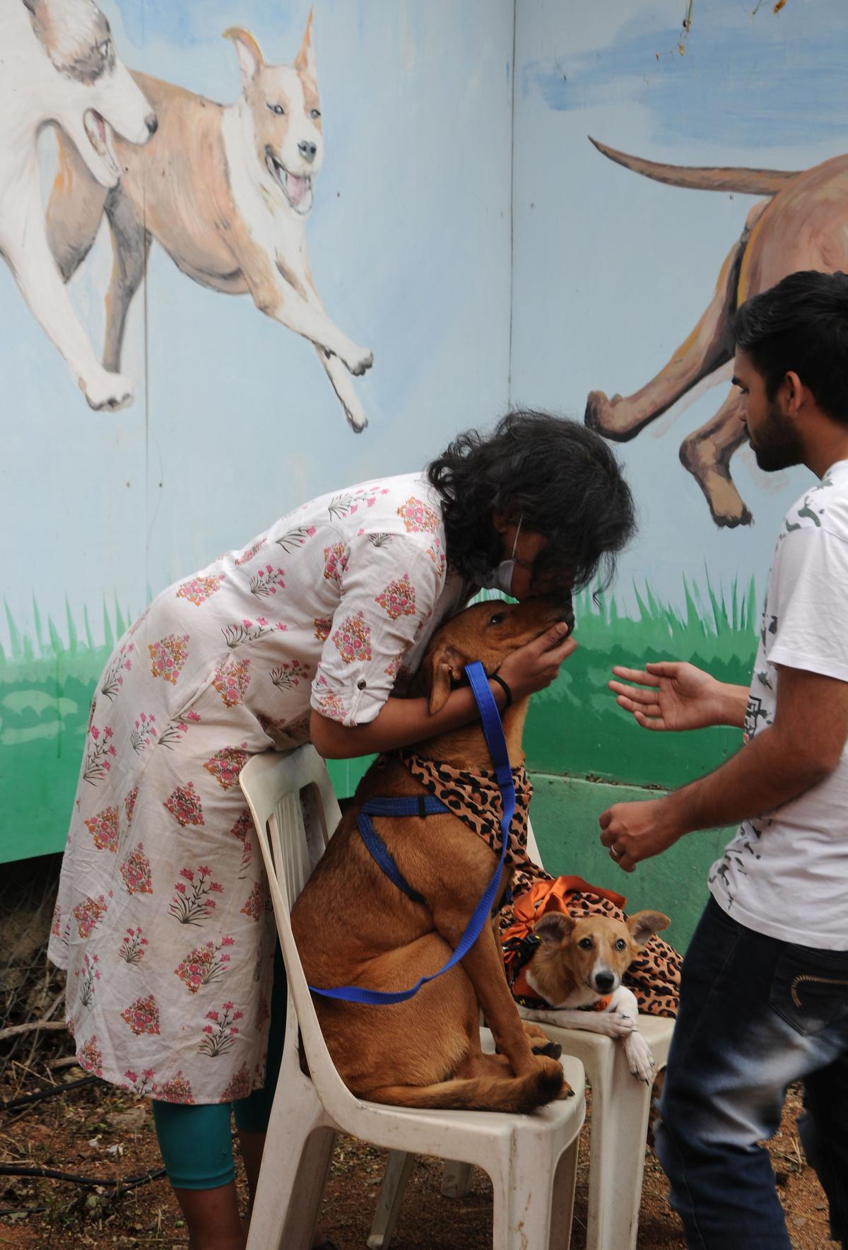 A woman with her dog at Dog Park, Gachibowli in Hyderabad.