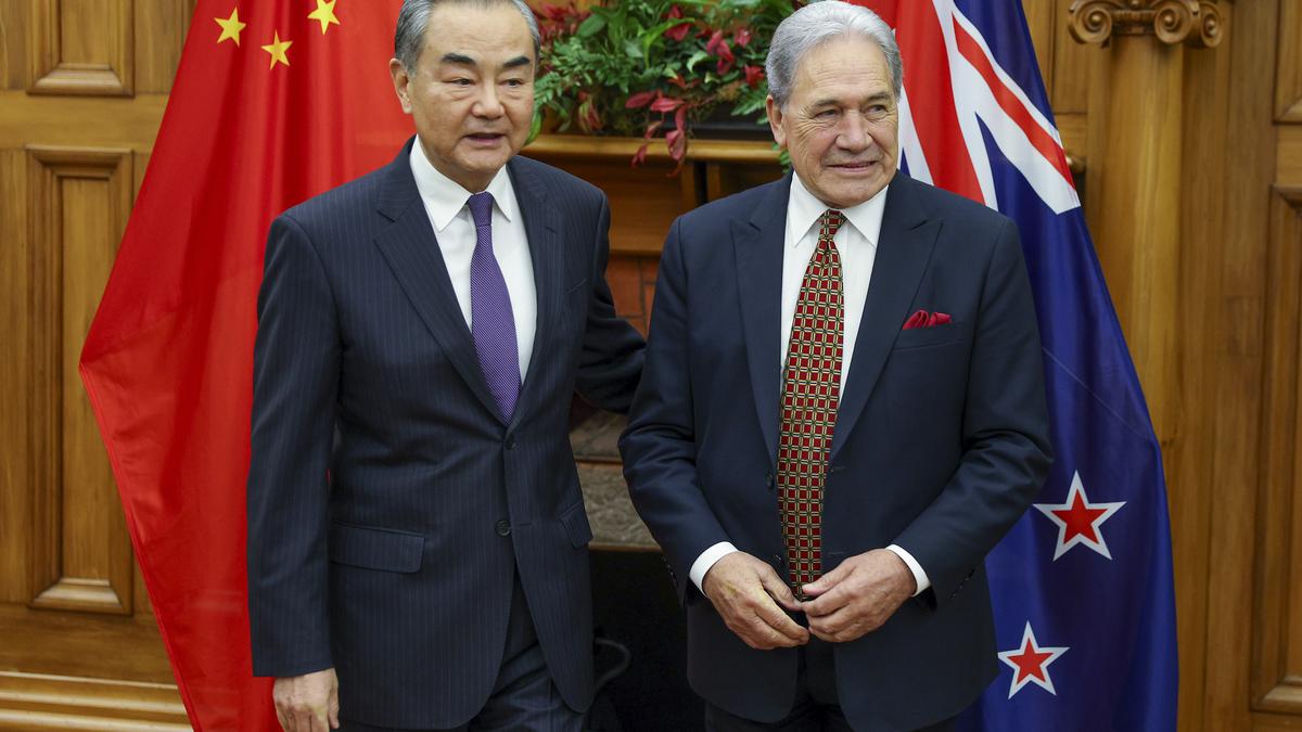 China's foreign minister meets New Zealand counterpart, beginning trip that also includes Australia